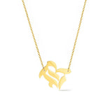 Gold-tone chain necklace featuring a bold Gothic-style initial charm that hangs asymmetrically to the side, adding a vintage-inspired yet edgy detail to your layered look.