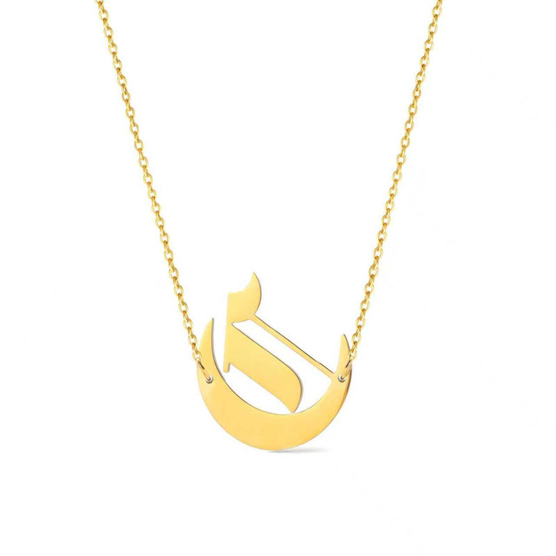 Gold-tone chain necklace featuring a bold Gothic-style initial charm that hangs asymmetrically to the side, adding a vintage-inspired yet edgy detail to your layered look.
