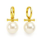 Sleek gold-tone toggle bar earrings featuring a lustrous pearl drop, blending modern structure with timeless charm for a refined, fashion-forward statement.