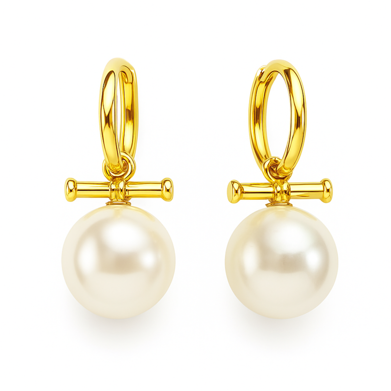 Sleek gold-tone toggle bar earrings featuring a lustrous pearl drop, blending modern structure with timeless charm for a refined, fashion-forward statement.