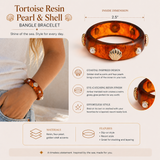 Tortoise Resin Pearl & Shell Bangle Bracelet with product details on a beige background
