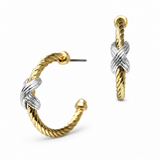 A pair of twisted cable hoop earrings in yellow gold and silver, featuring a knotted crossover detail on each hoop, shown on a clean white background.