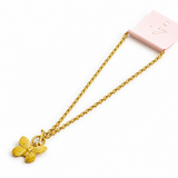 Gold butterfly necklace on a white background with a pink box.
