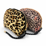 Quilted cosmetic case with a vintage-inspired leopard print design, featuring a soft padded texture and zip closure for stylish and functional storage.