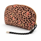 Quilted cosmetic case with a vintage-inspired leopard print design, featuring a soft padded texture and zip closure for stylish and functional storage.