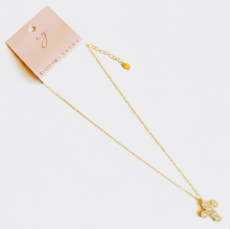 Elegant vintage-inspired necklace featuring a delicate cross pendant adorned with lustrous pearls and intricate detailing. Suspended from a fine chain, this piece blends timeless charm with a touch of sophistication—ideal for both faith-inspired style and classic fashion statements.