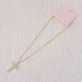 Gold-tone necklace featuring a vintage-inspired cross pendant adorned with sparkling crystals for a timeless and elegant look.