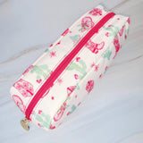 Compact cosmetic case with a playful Western-inspired design, ideal for daily use—featuring a zip closure and spacious interior to keep your beauty essentials organized in style