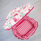 Stylish travel cosmetic case featuring a Western-inspired design with whimsical details, sturdy zip closure, and a convenient top handle—perfect for organizing beauty essentials on the go.