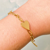 Modern heart bracelet featuring a charming side-positioned heart accent on a link chain. The You Are My Side Heart Bracelet offers a sweet and sentimental touch, perfect for everyday wear or meaningful gifting.