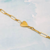 Modern heart bracelet featuring a charming side-positioned heart accent on a link chain. The You Are My Side Heart Bracelet offers a sweet and sentimental touch, perfect for everyday wear or meaningful gifting.