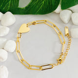 Modern heart bracelet featuring a charming side-positioned heart accent on a link chain. The You Are My Side Heart Bracelet offers a sweet and sentimental touch, perfect for everyday wear or meaningful gifting.