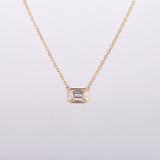 bezel-set-emerald-diamond-necklace-sustainable-gold