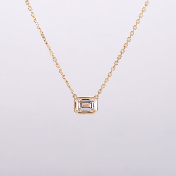 bezel-set-emerald-diamond-necklace-sustainable-gold