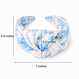White headband with blue floral pattern and measurements on a white background