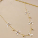 Bows And Bells Festive Necklace