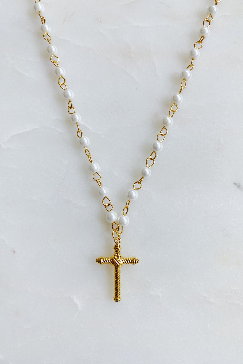 Collier pendentif croix câblée