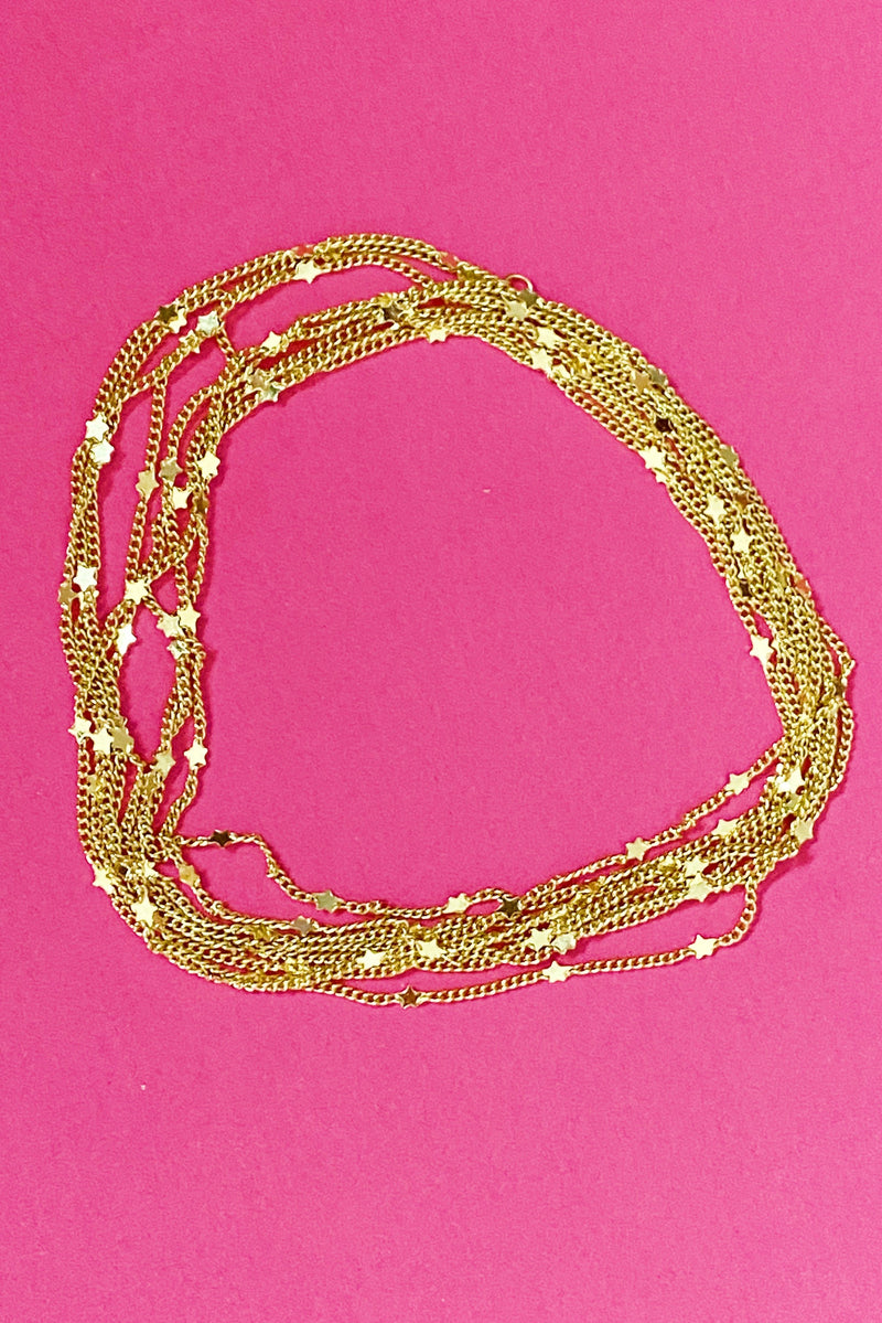 gold chain necklace with tiny star charms wrapped in circle