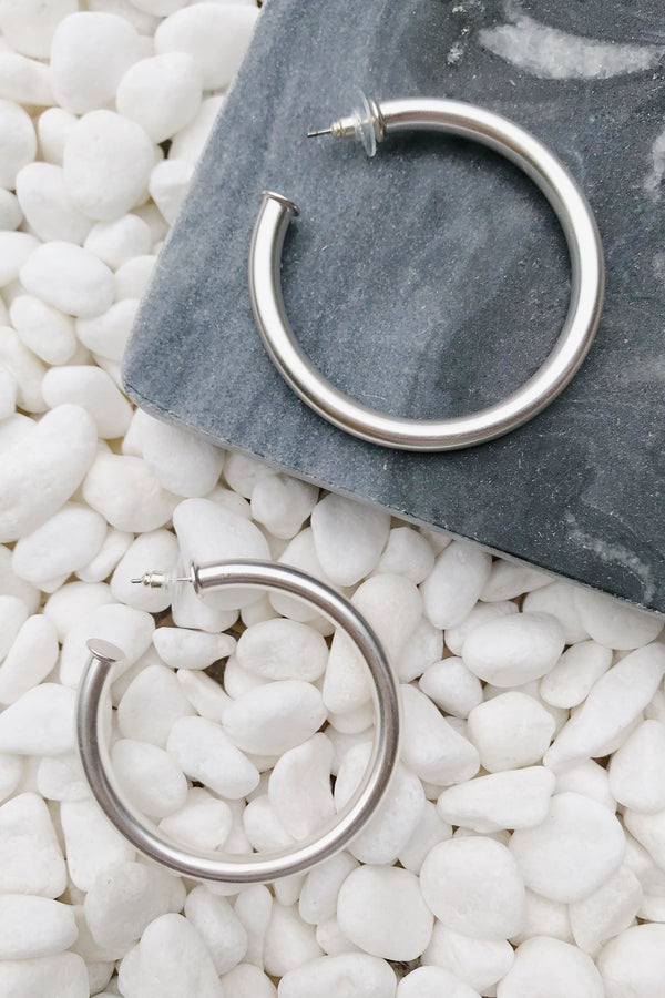 Tube matte silver hoop earrings from online Jewelry Boutique Ellison + Young