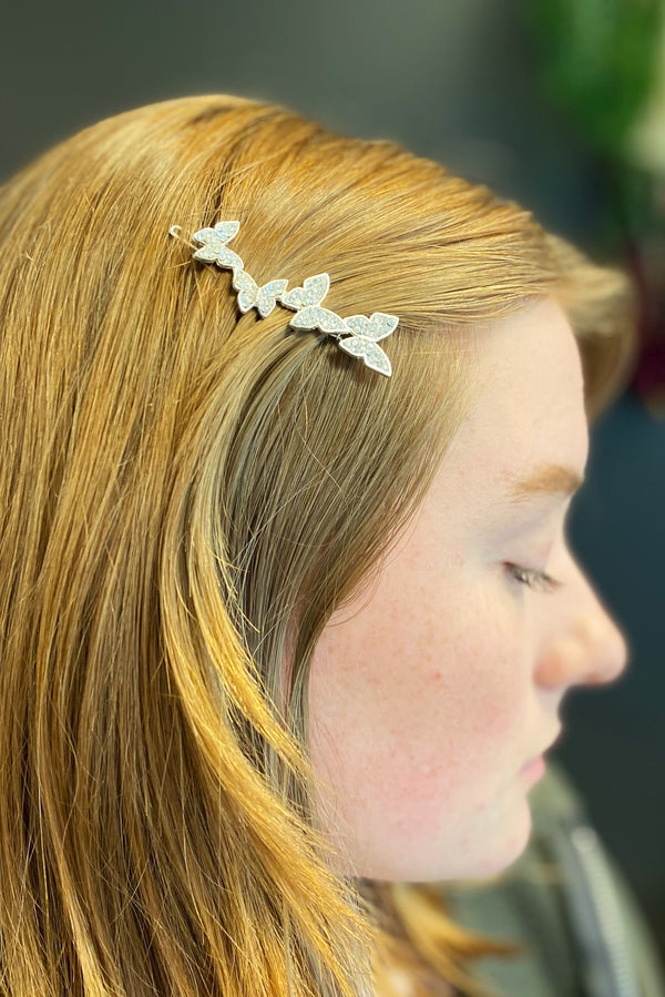 Pince à cheveux s'envoler