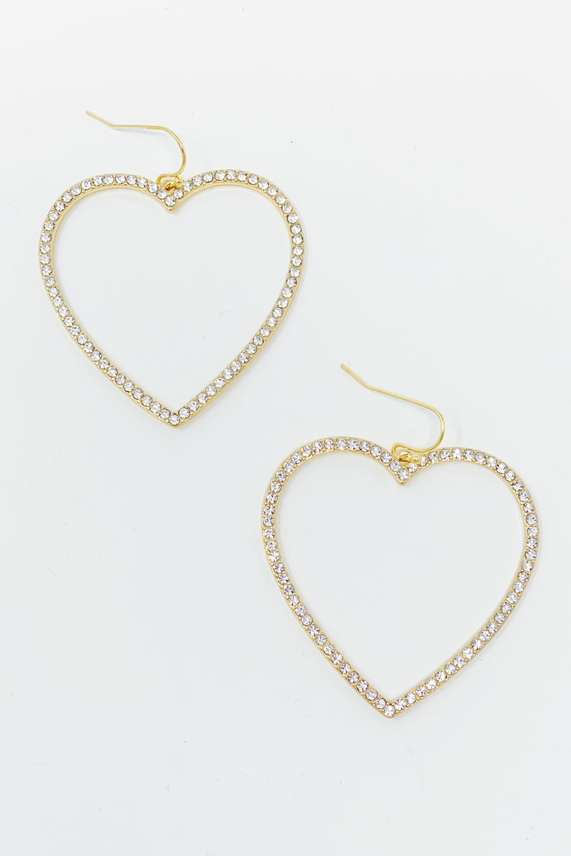 gold dangling heart hoop earrings displayed on white background