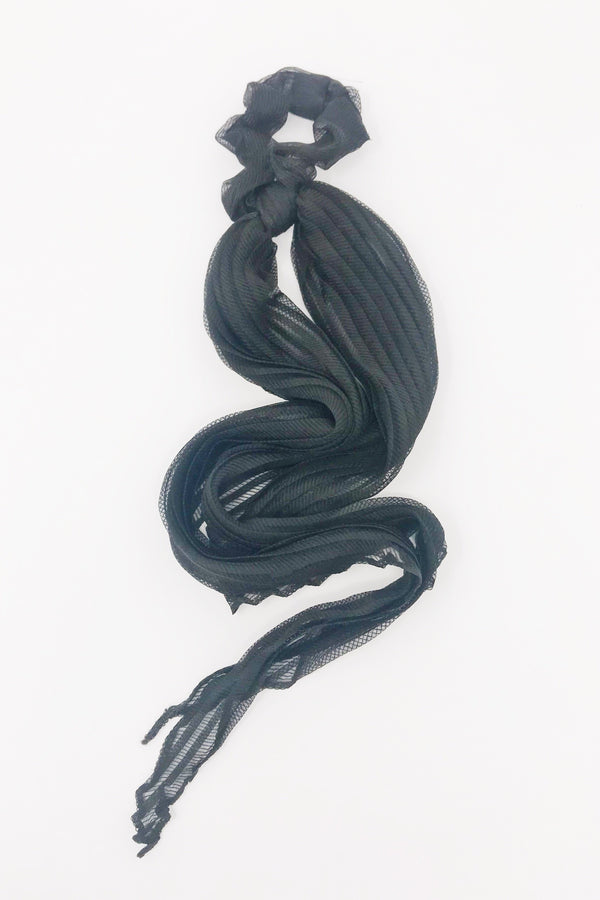 Trendy hair scrunchies from online clothing Boutique Ellison + Young make the perfect hair accessory