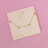 Gold chain necklace featuring a “Mama” initials in a polished gold finish, designed as a meaningful everyday or giftable piece.